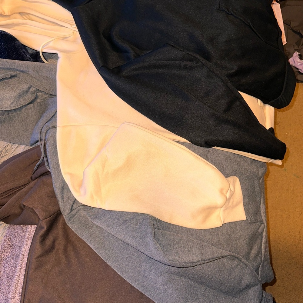Stylish Hoodie Collection in Black, Cream, and Gray